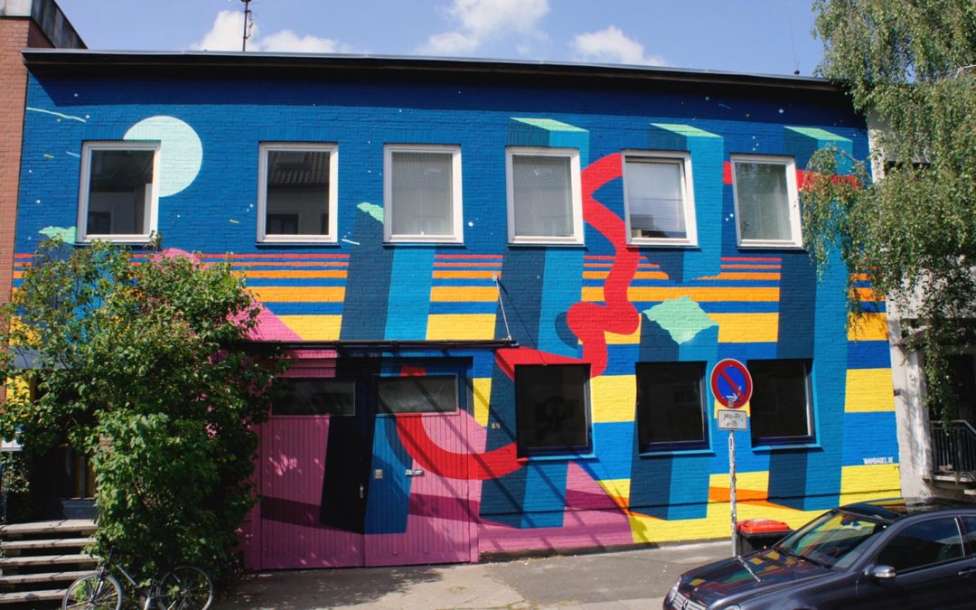 Farbenfrohe Fassadengestaltung – Farbe für’s Viertel